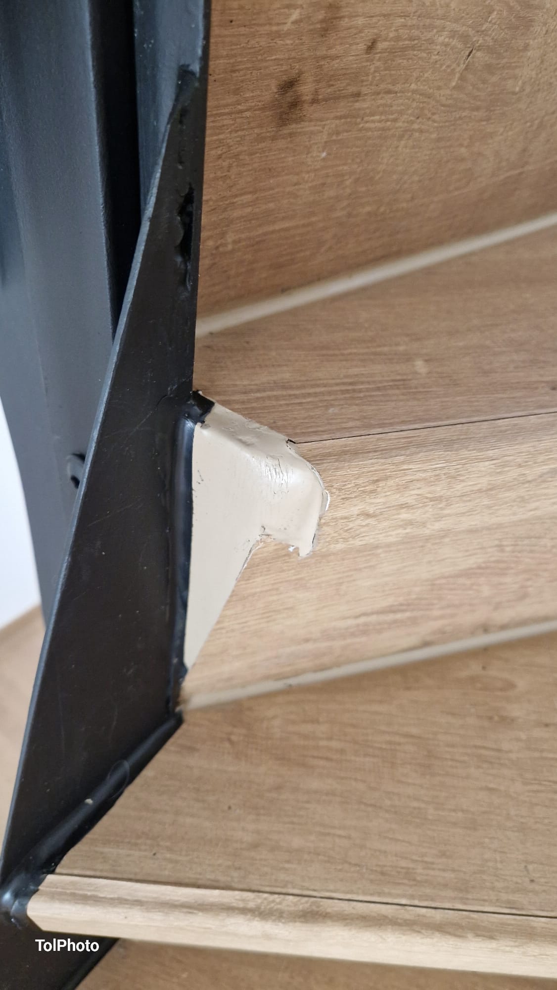 Before — Rough unfinished stair edge